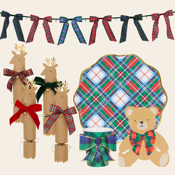 Decorate your Christmas dinner table with our tartan plates, napkins, cups, crackers and add a festive flair with the tartan bow garland. Image1