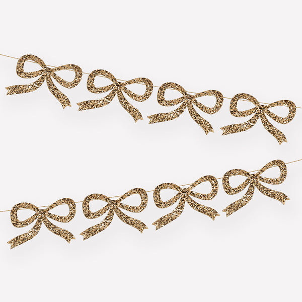 Our Christmas garland is crafted with gold glitter fabric bows, perfect for a Christmas wall decoration or Christmas table decoration. Image1
