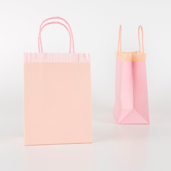 Our pink fringed bags are perfect as paper gift bags and party gift bags. Image2