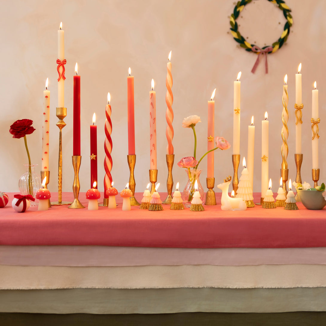 Our decorative candles feature striking pink and red bows and red wicks, ideal for your table or mantel or as a Christmas host gift. Image2