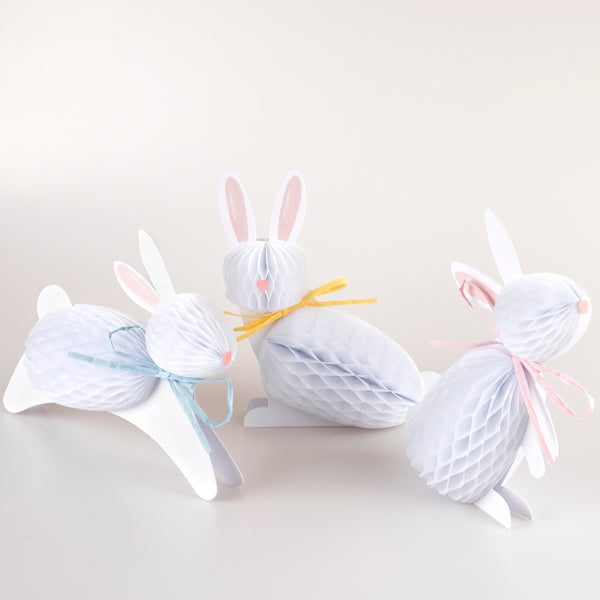Our Easter bunny decorations, crafted with honeycomb paper and raffia ribbons, look amazing. Image1