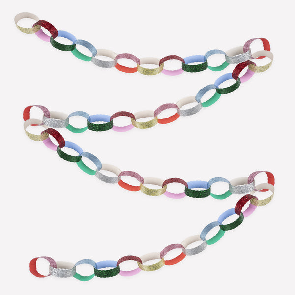 Our paper chain kit includes slot-together chains in jewel-like colours with shimmering glitter, a stylish decoration for Christmas. Image1