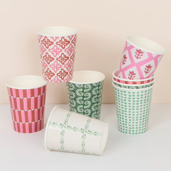 Our Christmas cups, made from paper, feature Molly Mahon block print designs in seasonal colours, perfect for hot and cold drinks. Image1