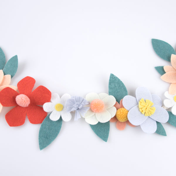 Our special party garland is crafted from felt, with flowers with pompom centres. Image4