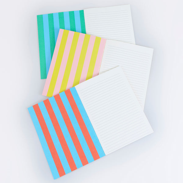 Our lined notebooks come in a set of 3, beautifully designed with vibrant striped covers and a neon coral stitched spine. Image4