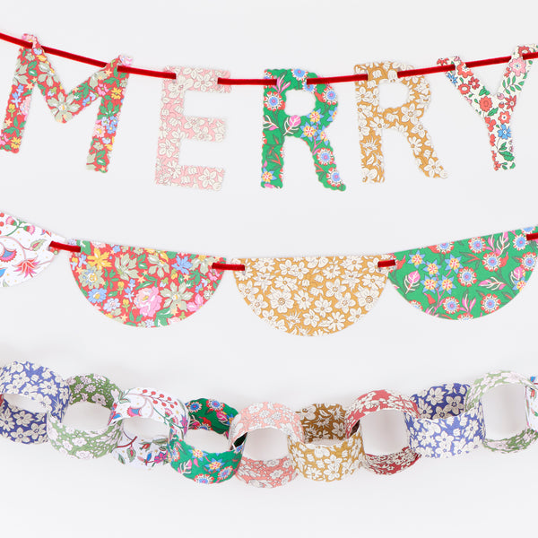 Our advent calendar is beautifully presented in a large Liberty print design box with 24 boxes inside containing stationery and decorations. Image11
