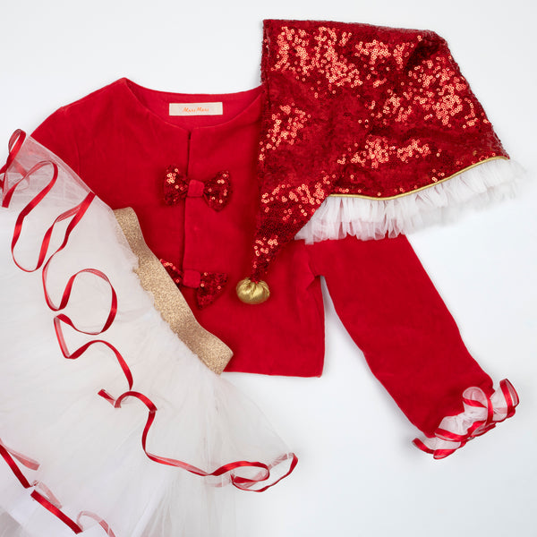 Make your kids look amazing this Christmas with a red and white Christmas costume of a velvet skirt, tulle jacket and red Santa hat. Image2