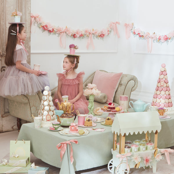 Our elegant paper garland is crafted with paper flowers and pink bows for a really beautiful hanging decoration ideal for a bridal shower. Image2