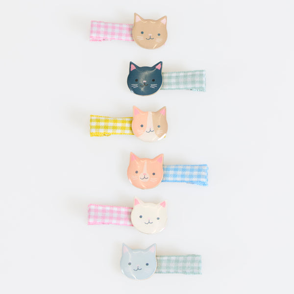 Our cute hair clips feature kittens and gingham ribbons, the perfect hair accessories for everyday style or for party hairstyles. For ages 8+. Image2