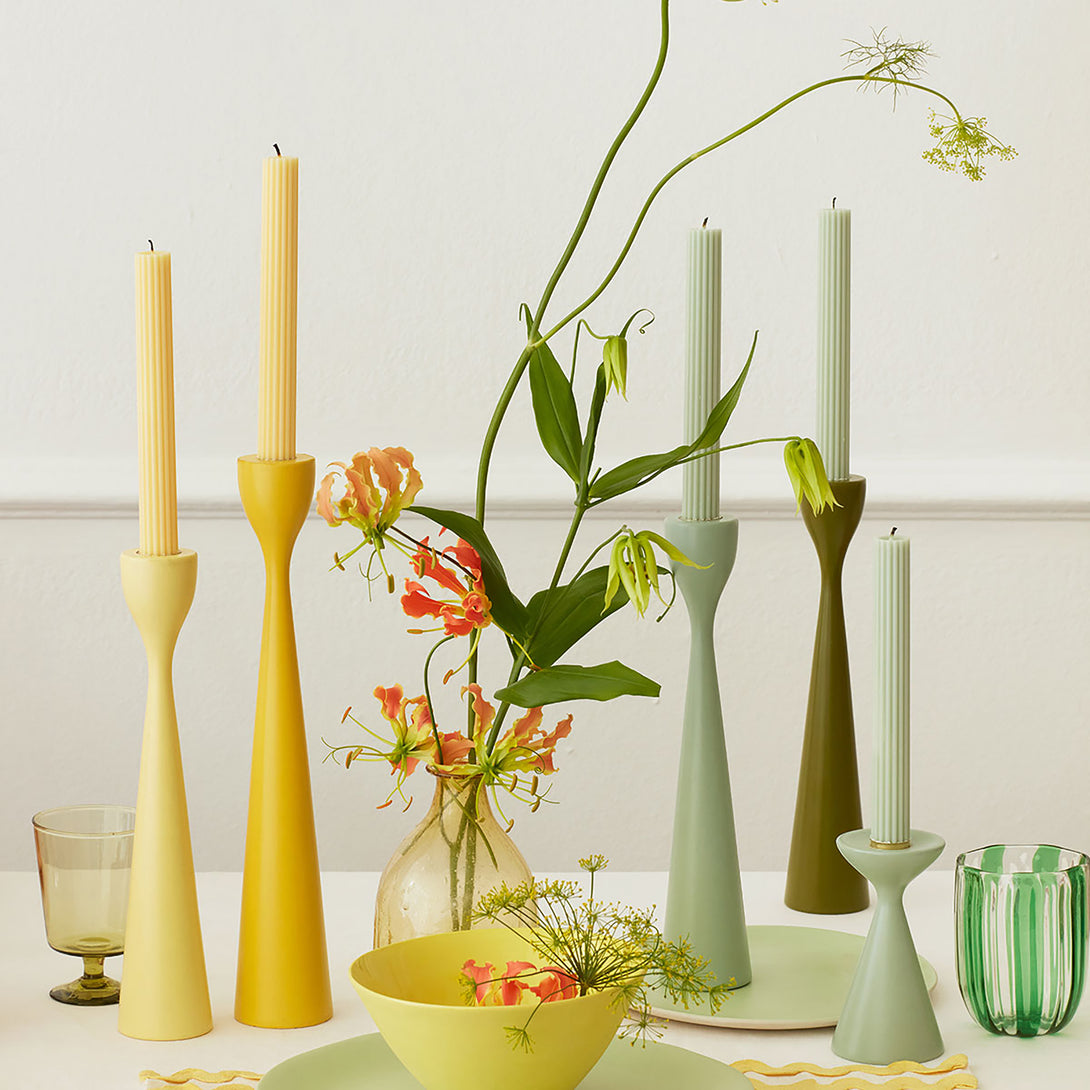 Our decorative candles in coral, pink, blue, sage and yellow will add colour to your party table.