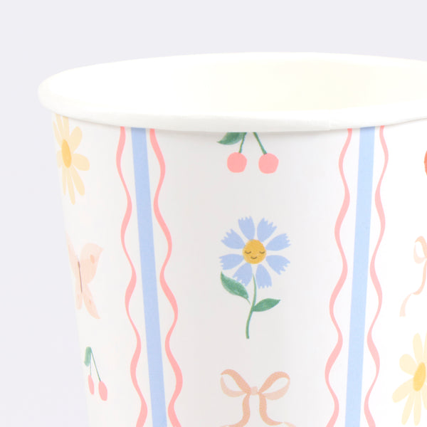 Our party cups, made from sturdy paper, are suitable for hot and cold drinks, and feature a pretty pink, blue and red design ideal for birthdays. Image3