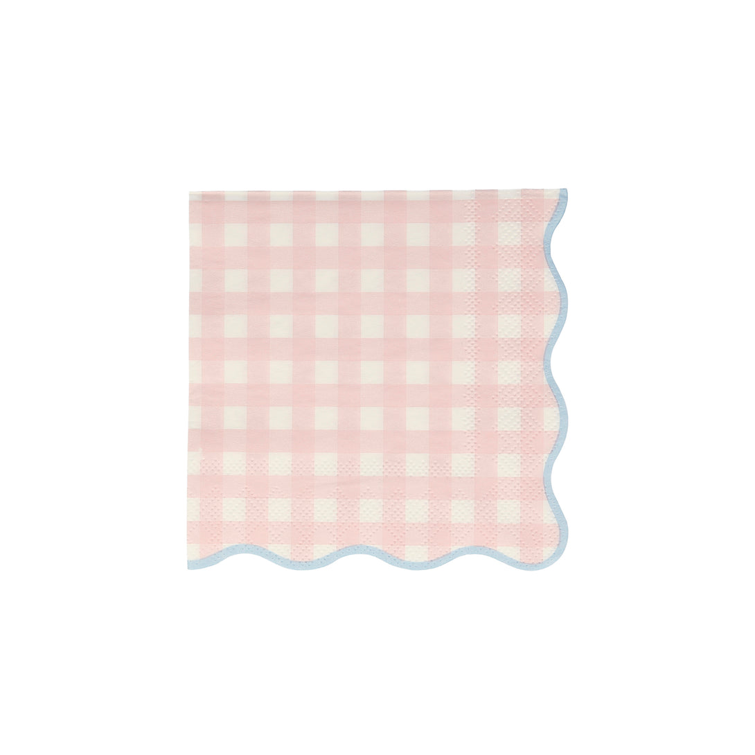 Our paper napkins with a gingham print and scalloped edge will look amazing on your party table.