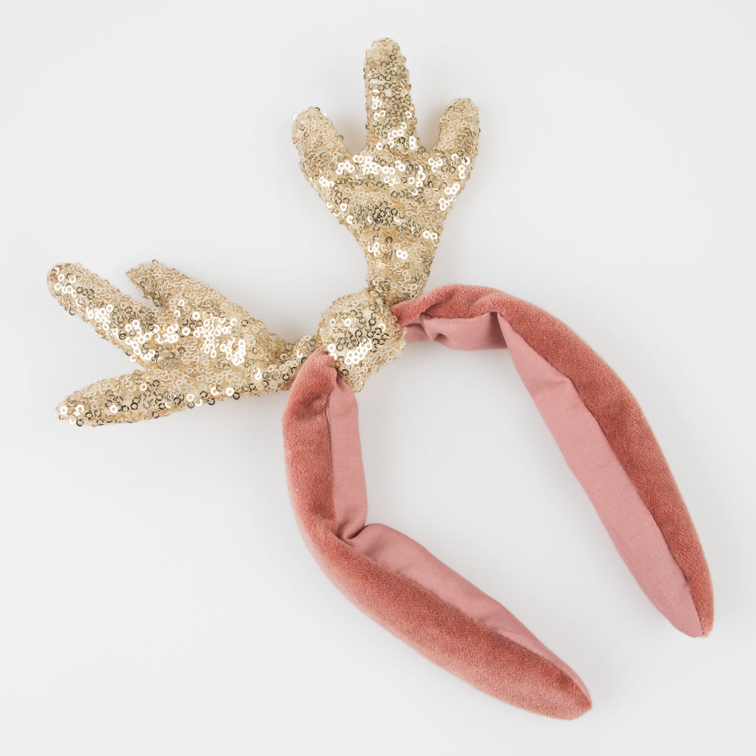 Make your Christmas hair look amazing with our antler headband, made with soft velvet and a sequinned gold fabric material.