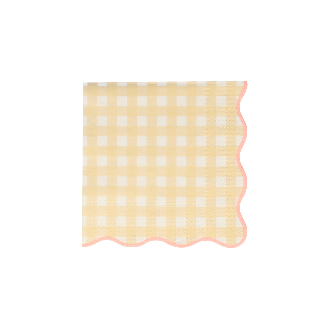 Our paper napkins with a gingham print and scalloped edge will look amazing on your party table.