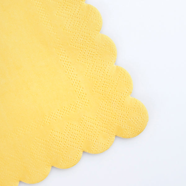Our paper napkins, in bright yellow, have a stylish scalloped edge - ideal for baby showers or birthday parties. Image2