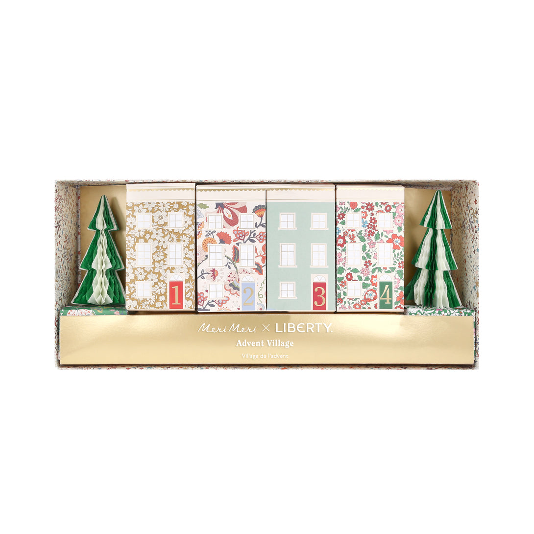 Our Christmas advent calendar creates a 3D village scene, with Liberty prints, shiny gold foil details and honeycomb trees, to fill with fun gifts. Image6