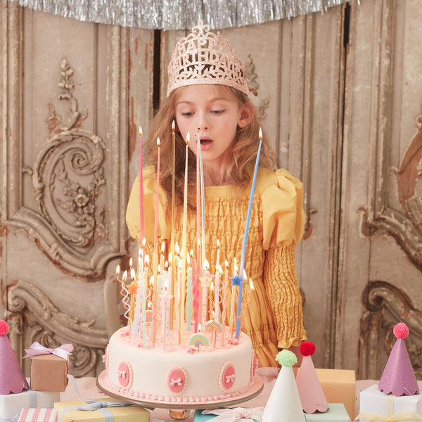 Our gold candles, with a tapered shape, are excellent as birthday cake decorations or whenever you want tall candles. Image2