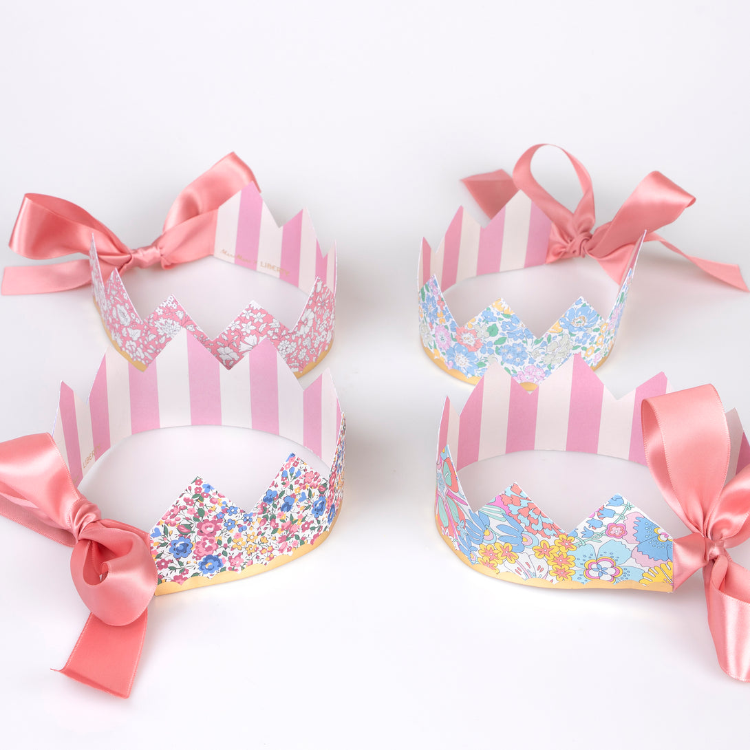 Our sophisticated paper hats are crowns with Liberty print designs, pink ribbons and gold foil, perfect for bridal showers and baby showers.