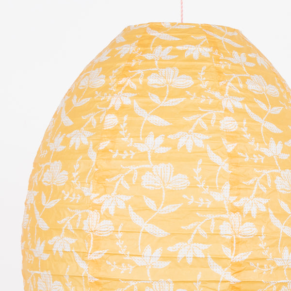 Our paper lanterns, a set of three with pink and yellow floral print designs, feature a round, oval and wavy shape, great for chic parties. Image2