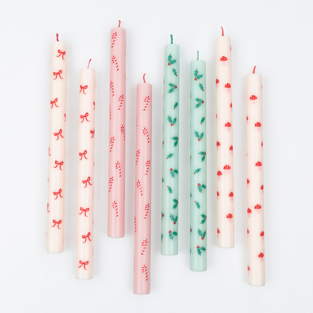 Use our Christmas table candles, with festive patterns and colours, to light up your dinner table or mantel. Image4