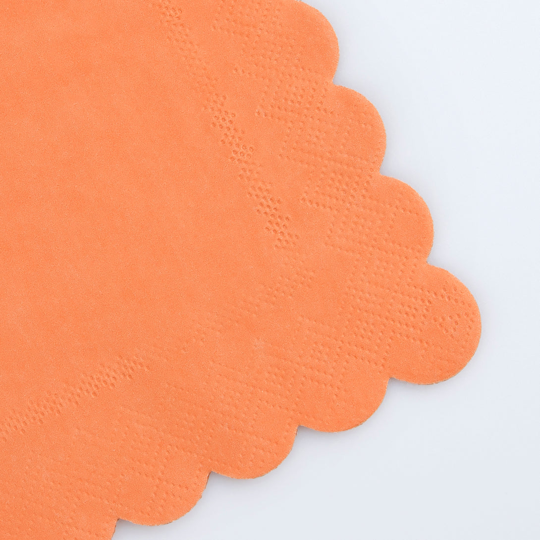Our party napkins, in a bright orange colour, have a stylish scalloped edge - ideal for a festival or BBQ.