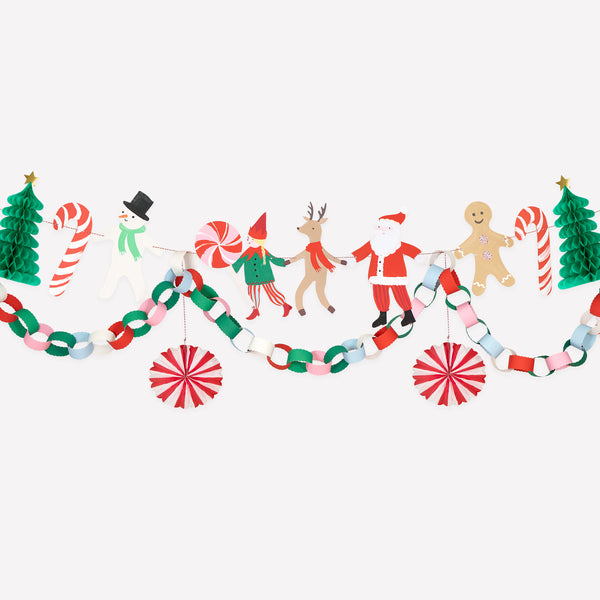 Our jolly Christmas garlands set includes colourful characters and icons, 3D paper fans, 3D Christmas trees and a paper chain to make and add. Image1