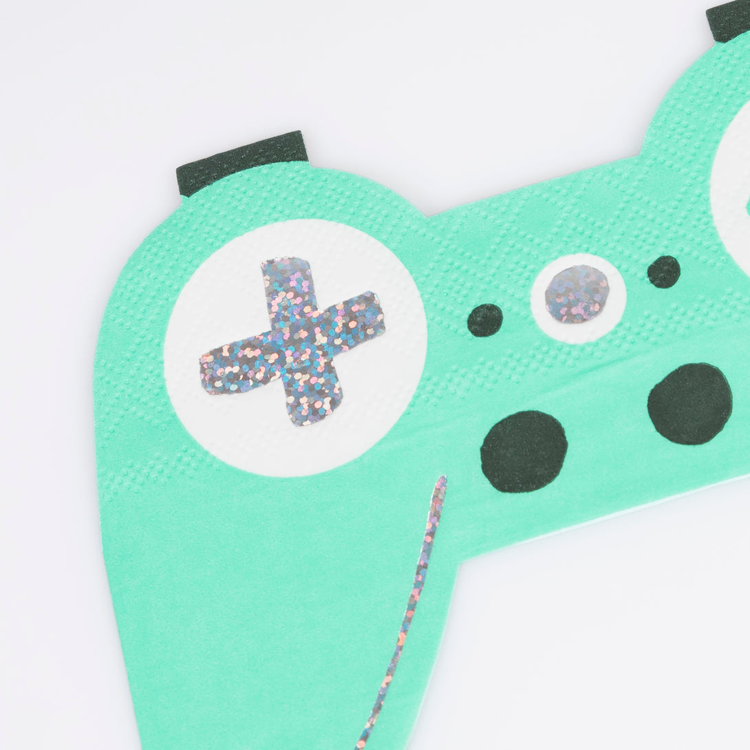 Throw a cool birthday party with a video theme with our set including paper plates, cups, napkins and an shimmering tinsel garland.  Image8