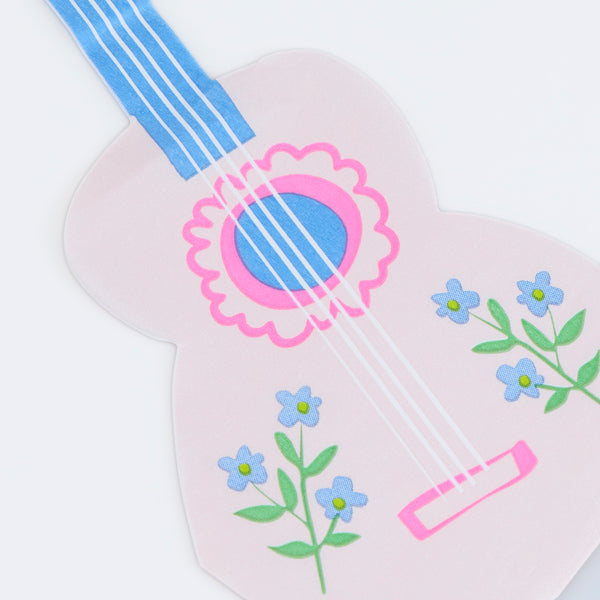 Our pink napkins, in the shape of a playful guitar, are made from 3-ply paper, ideal for any folk-inspired celebration or party. Image3