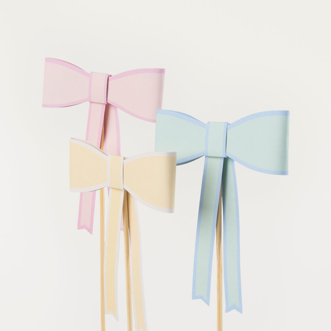 Our cake toppers feature pastel bows for an on-trend stylish look.