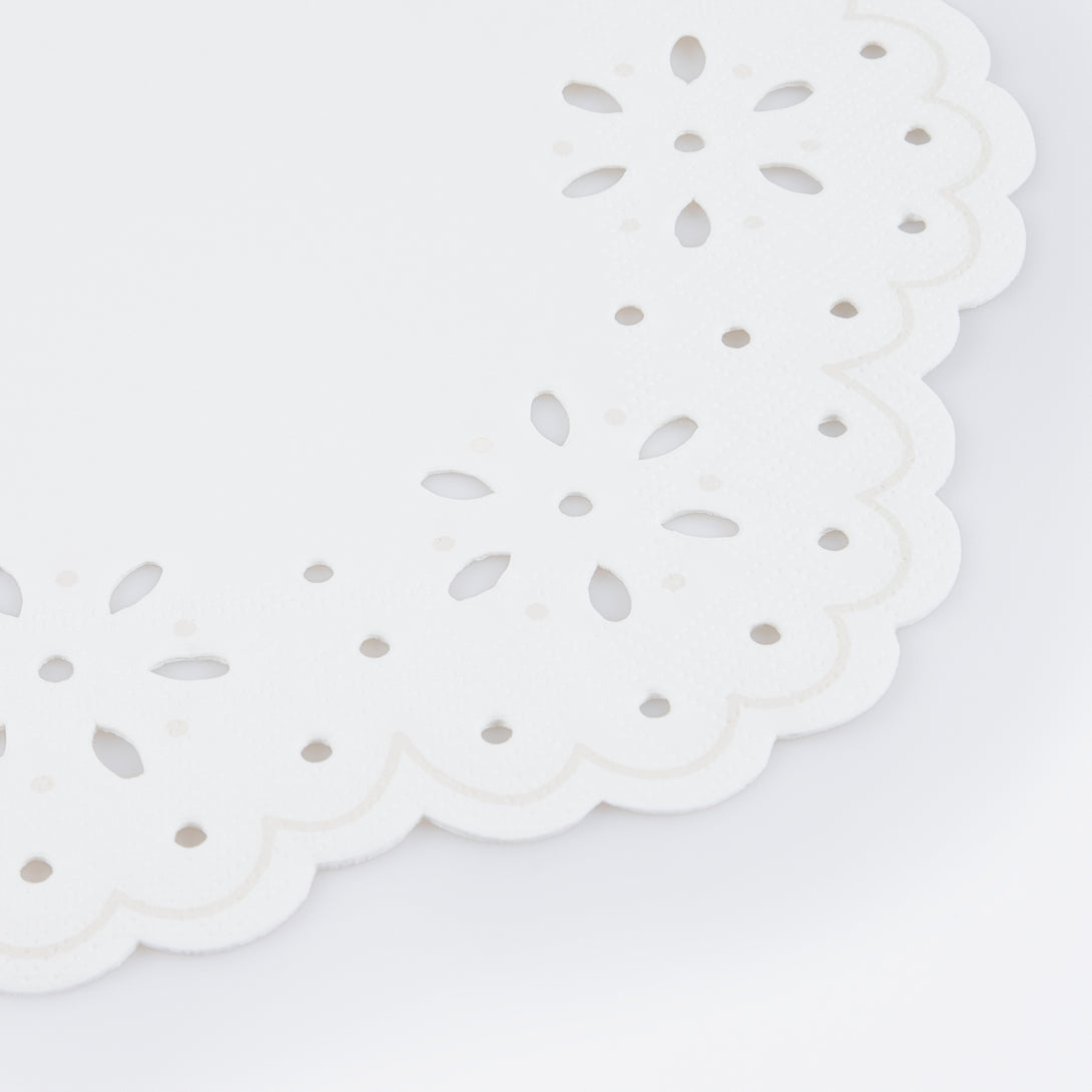 Our large party napkins, in white, have an embossed lace design and make pretty baby shower napkins.