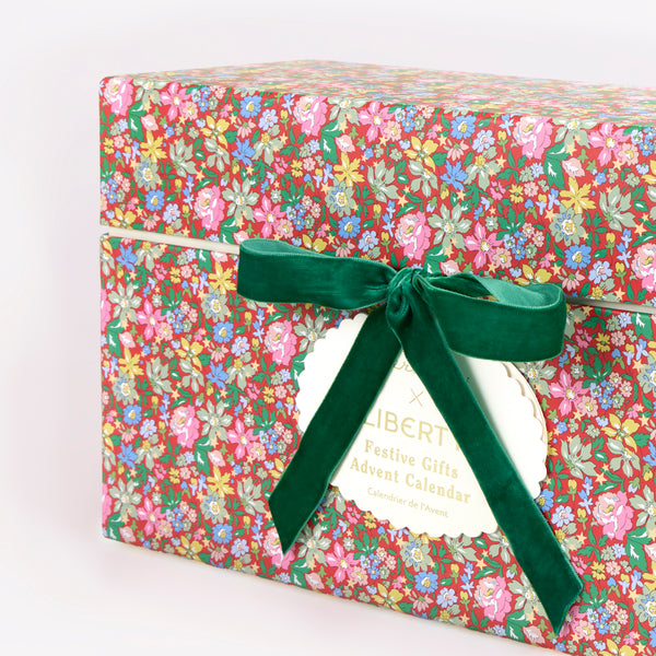 Our advent calendar is beautifully presented in a large Liberty print design box with 24 boxes inside containing stationery and decorations. Image5