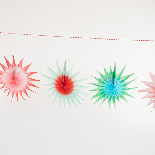 Our star garland, in bright colours, is the perfect modern Christmas garland. Image2