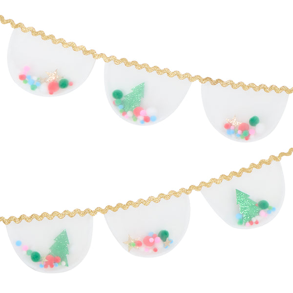 Our Christmas garland features white organza pennants filled with pompoms and glitter fabric stars and Christmas trees, with a ric rac trim. Image1