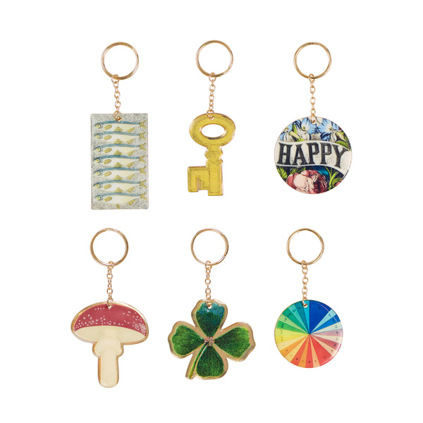 Our no snap Christmas crackers feature festive colours, keyring gifts and chic John Derian inspired embellishments for a fairytale feel. Image2
