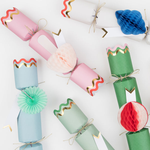 Our honeycomb crackers are colourful and stylish, and contain fun gifts, a party hat and a joke. Image4