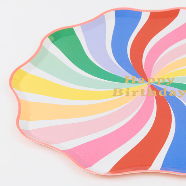 Our birthday plates, in large dinner plate size, feature a swirl of rainbow colours with the words Happy Birthday in shiny gold foil, joyful and fun. Image2