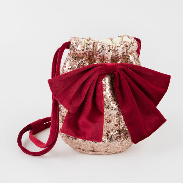 Our Christmas bag is the perfect accessory for Christmas dress up, with pink sequinned tulled and a big red velvet bow.