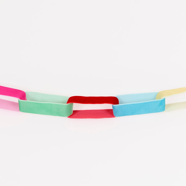 Our Christmas garland is made from velvet ribbons chainlinked to create a stunning decorative effect, ideal to use year after year. Image2