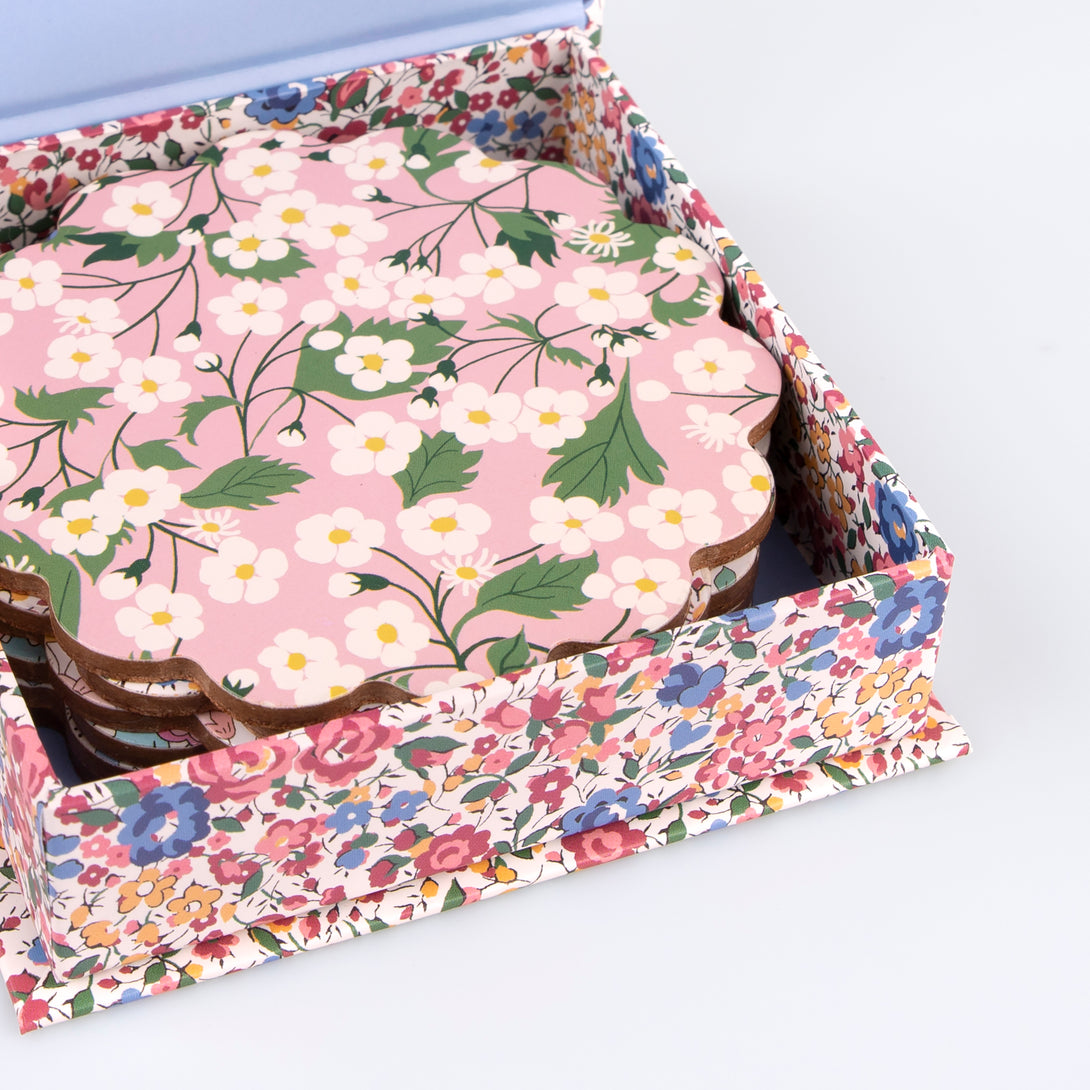 Our wooden coasters are made from a composite wood with floral Liberty prints, a laminated finish and a cork backing. Image5