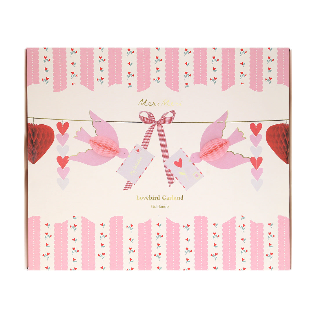 Our Valentine's decoration is a beautiful Valentine's garland with 3D hearts, love birds and gingham bows, all in pretty pink and red tones. Image4