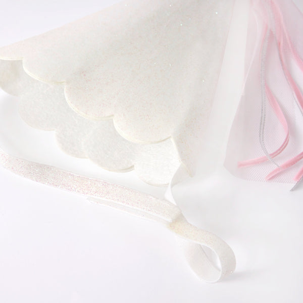 This costume, with a princess dress and hat with tassels, is perfect for a princess party. Image6