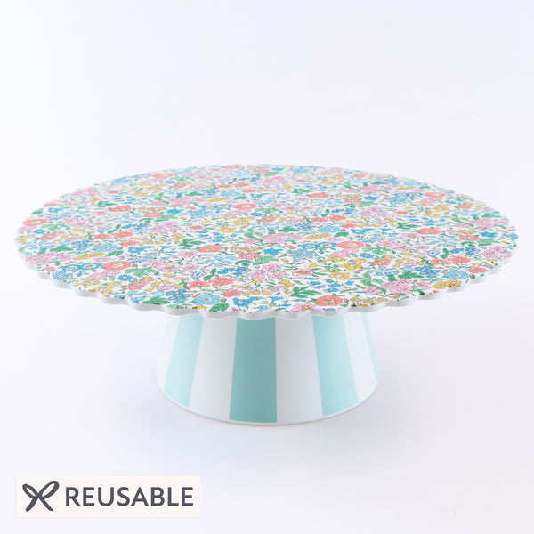 Our melamine cake stand features a pretty Liberty floral print design, with a striped base, a wonderful host gift and perfect for any special party. Image1
