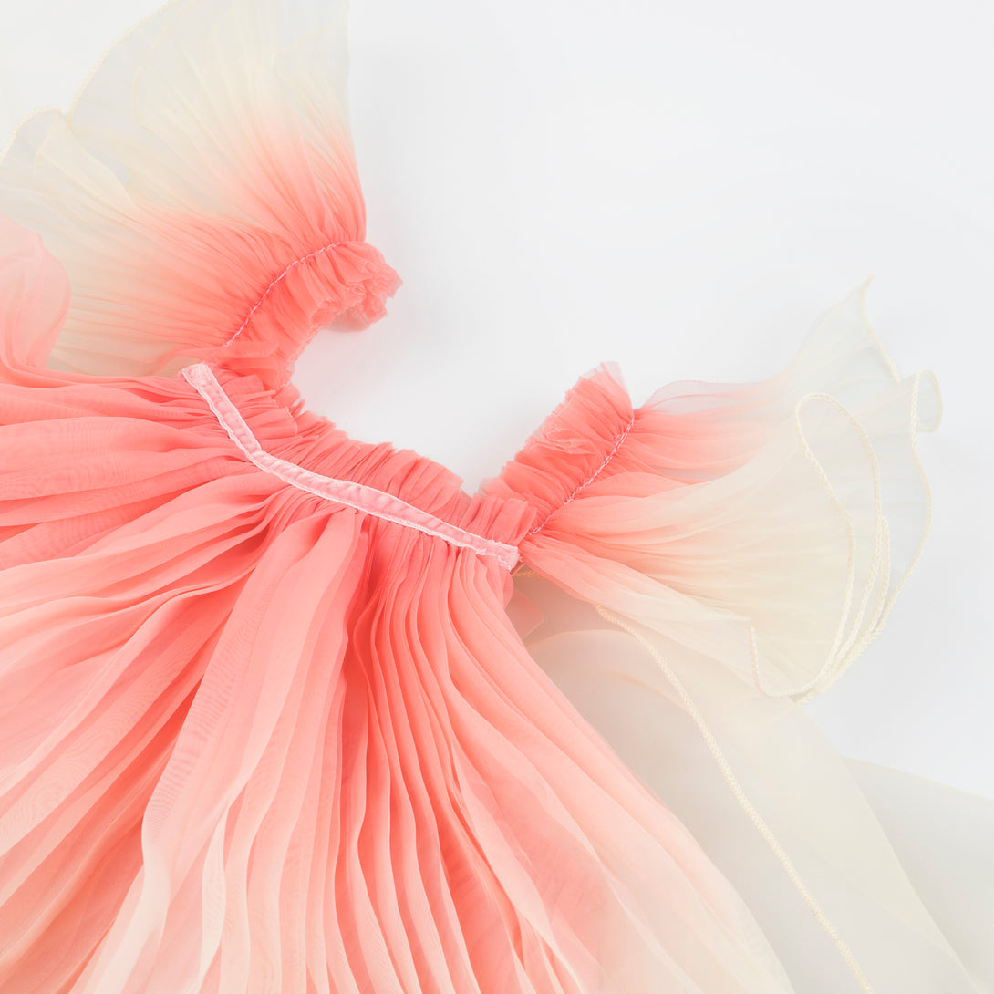 Our fairy costume includes a pink fairy dress and wings and a star wand. Image4