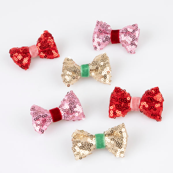 Accessorise your Christmas hairstyle with our sequin bows with velvet details, simply clip on for instant style. Image3