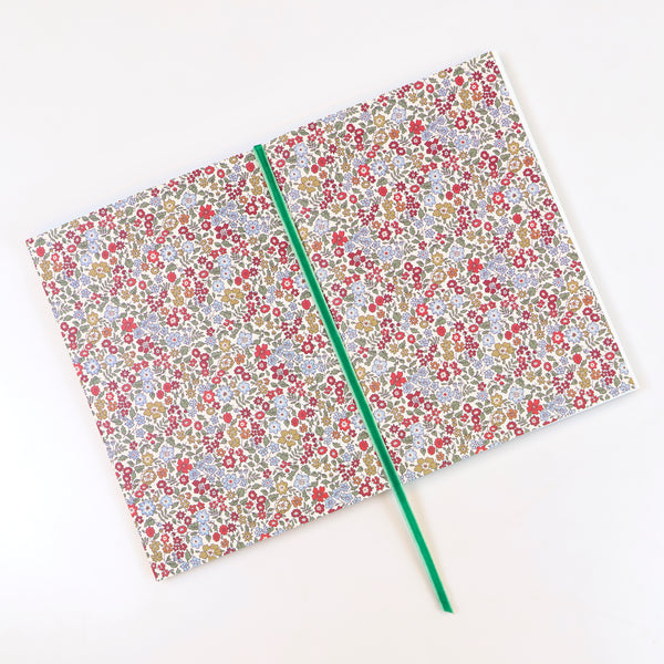 Our floral notebook features a Liberty print design cover, lined pages and a sage velvet ribbon bookmark, a wonderful Christmas gift for a writer. Image4