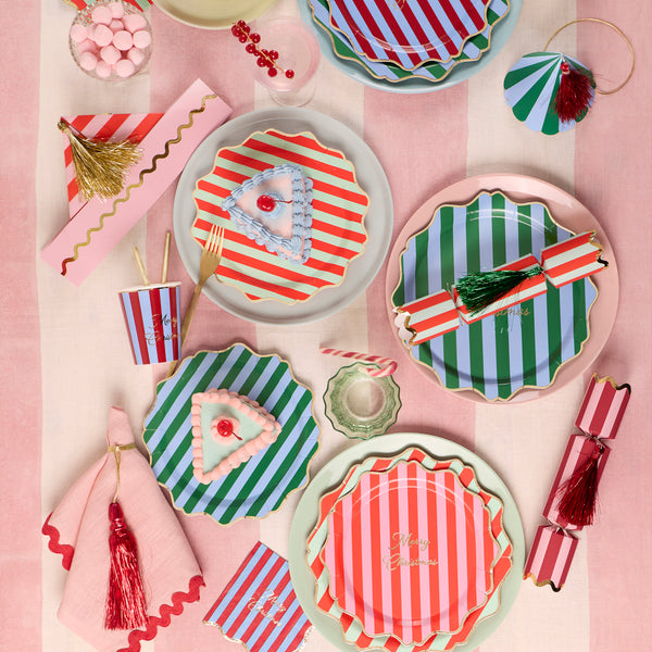 Our Christmas no-snap party crackers, with fun stripes and tinsel tassel details, contain a gold party hat, joke and a small gift. Image3