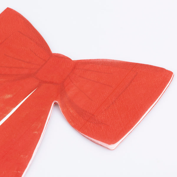 Our Christmas paper napkins, shaped like bows, are a classic festive red, ideal for a stylish dinner or party. Image2