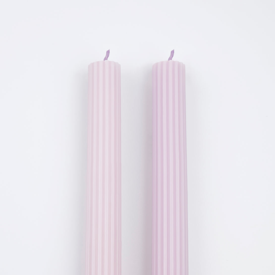Our tall candles, in a lilac colour, are perfect for any party with a purple theme.