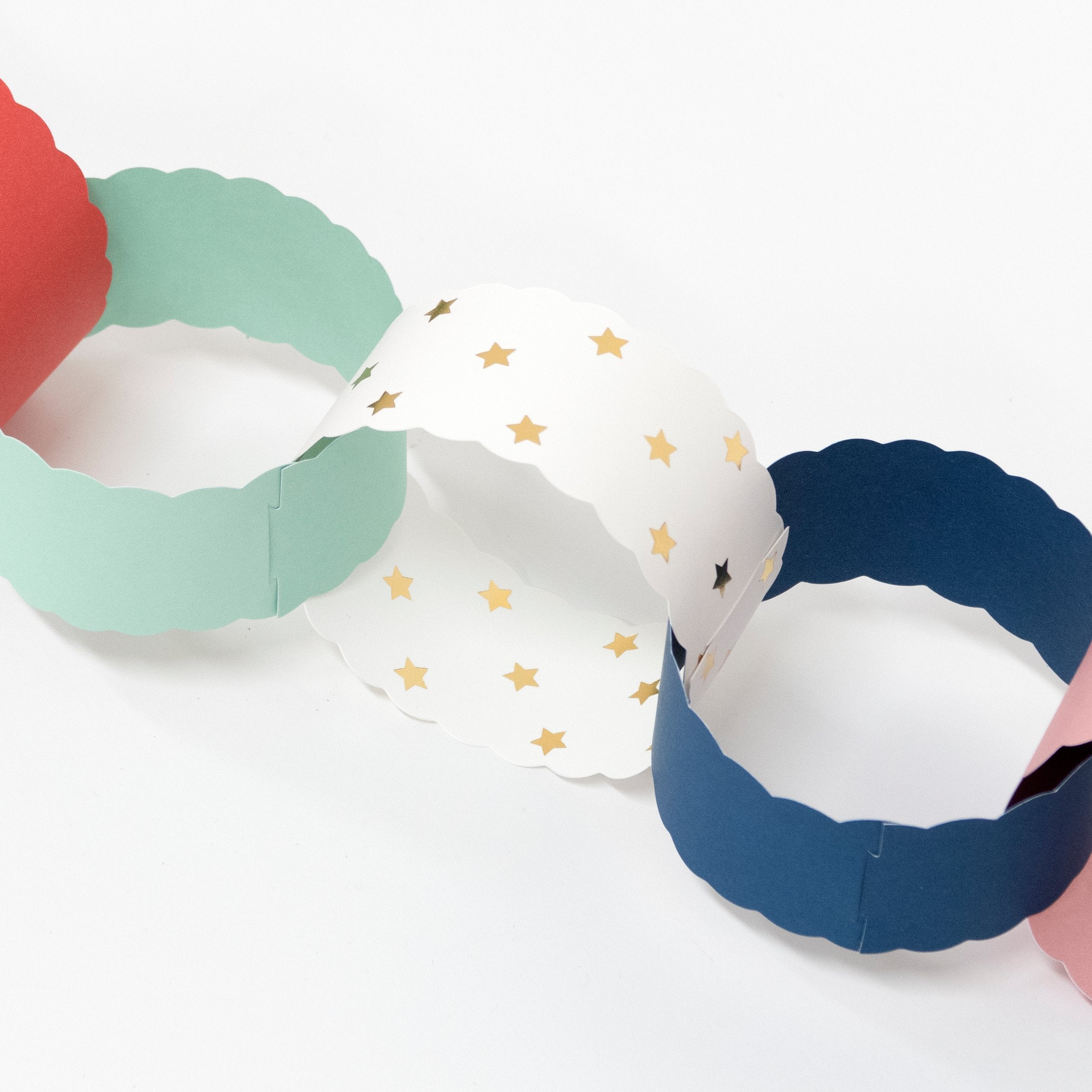 Our colourful paper chains have a stylish scalloped edge.