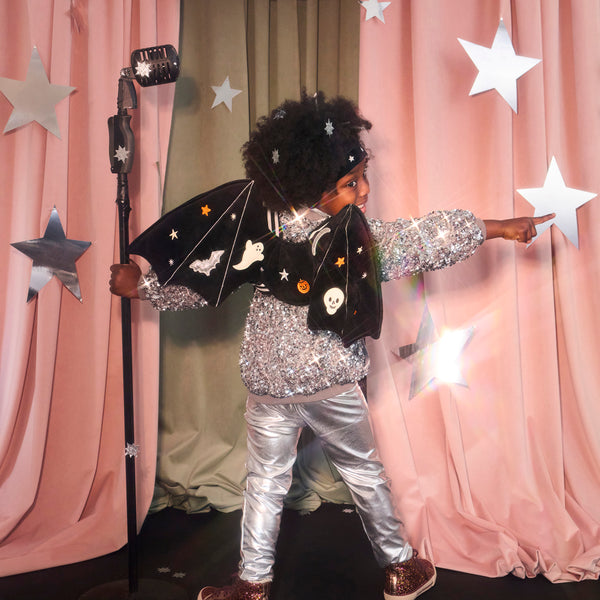 Our luxury black velvet bat costume features appliqued and embroidered wings with an adorable ear headband. Image1